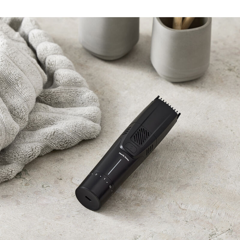 Sk&auml;ggtrimmer med vakuum