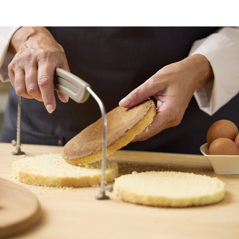 Justerbar tårtbottensdelare Justerbar tårtbottensdelare